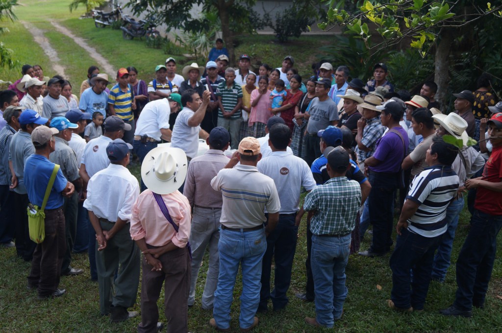 Farmers receiving technical training at a community meeting in Lachua, Guatemala. 